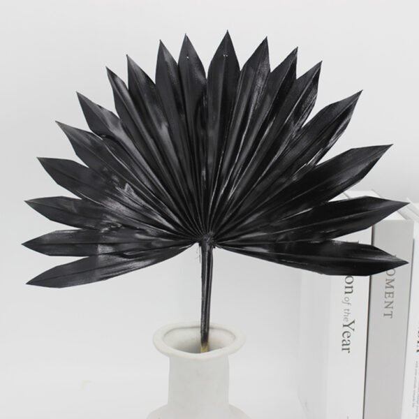 black color sun palm leaf flower