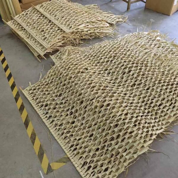 Real photos of palm leaf woven wall hangings produced in large quantities